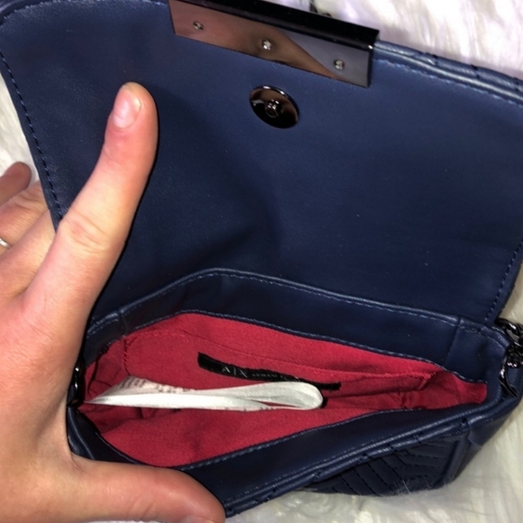 Armani Exchange navy cross body bag
$58 $0 - Picture 4 of 7